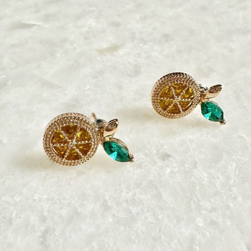 Bright orange stud earring with green